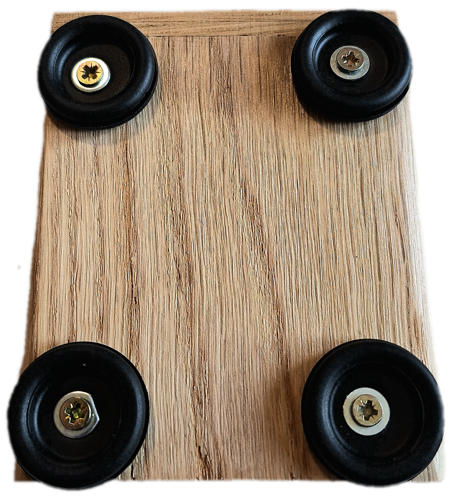 A close up view of the underside of the Rhyth-Mic G1 Stomp box showing the oak attractive oak construction and 4 chunky rubber feet
