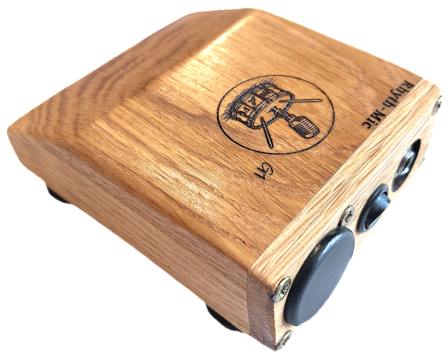 Another view of the Rhyth-Mic G1 posed rear oblique view showing off attractive oak construction, wedge shape and laser etched graphics and branding., on/off switch, battery cover and 6.3mm output jack