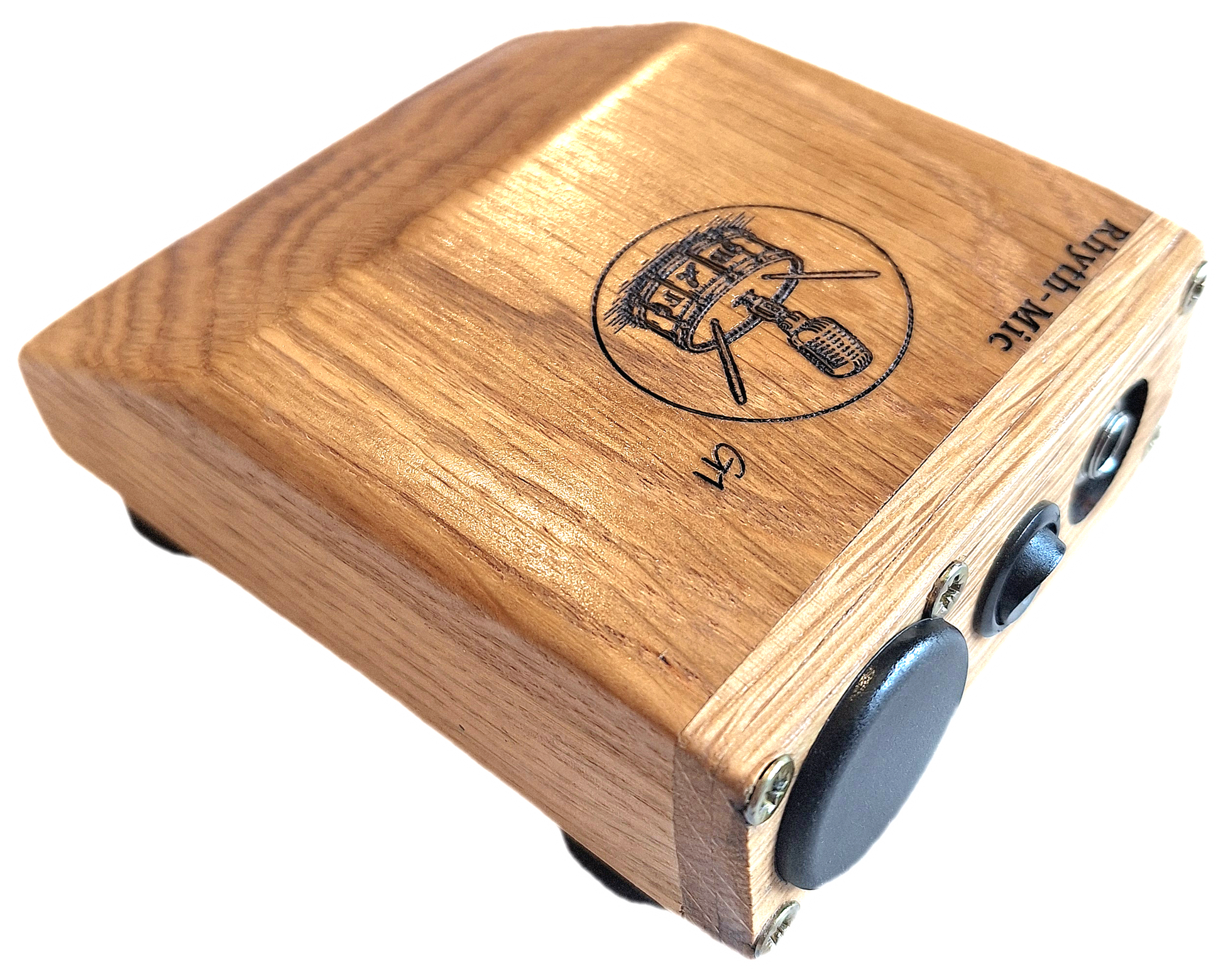 Another view of the Rhyth-Mic G1 posed rear oblique view showing off attractive oak construction, wedge shape and laser etched graphics and branding., on/off switch, battery cover and 6.3mm output jack