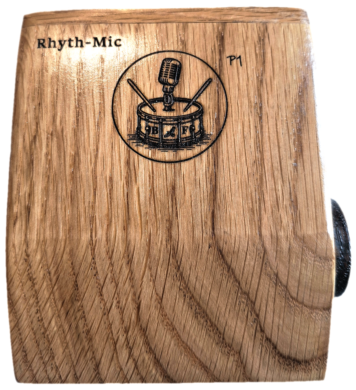 Rhyth-mic P1 play-through stompbox in solid oak wood showing laser etched branding of a microphone on a drum. In top down view