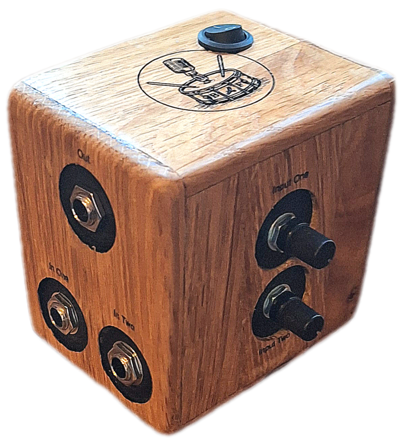 RhythMix audio mixer. Attractive oak cube with laser cut graphics, control switches,  input/output jacks and power switch. 