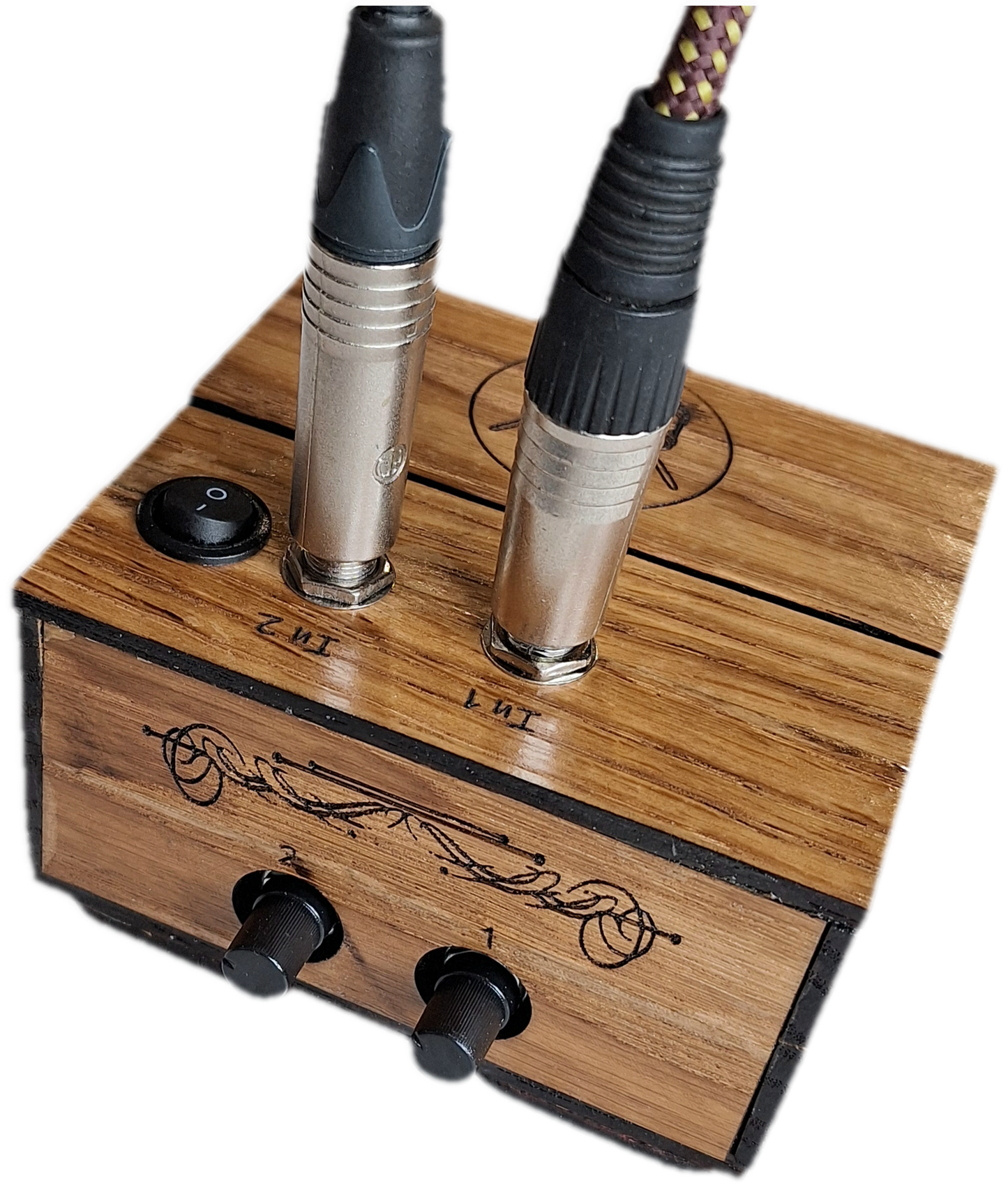 handmade oak 2 channel audio mixer, demonstrating 2 input leads connected