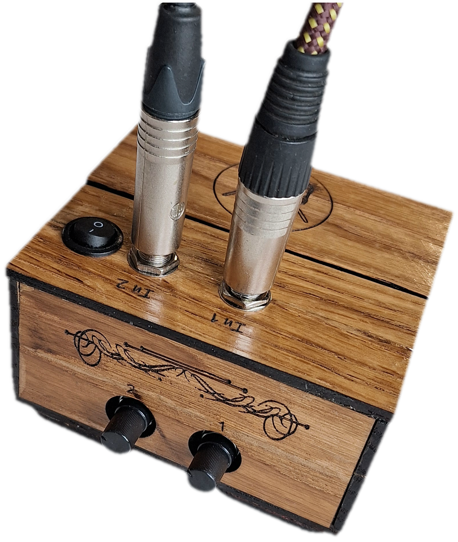 handmade oak 2 channel audio mixer, demonstrating 2 input leads connected